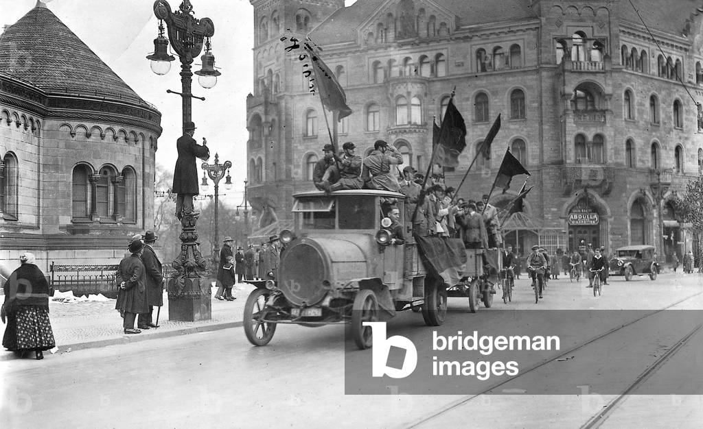 Reich Banner car in the streets of Berlin (b/w photo)