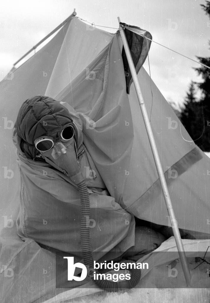 Mountaineer Mathias Rebitsch during preparations, 1954 (b/w photo)