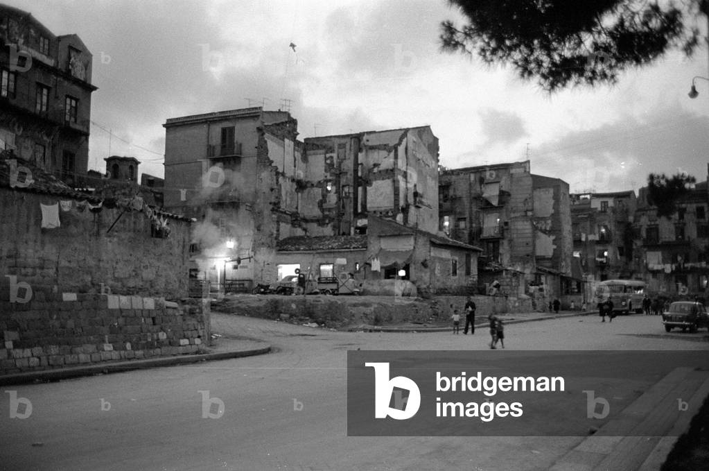Ramshackle houses in a residential area of Palermo, 1963 (b/w photo)