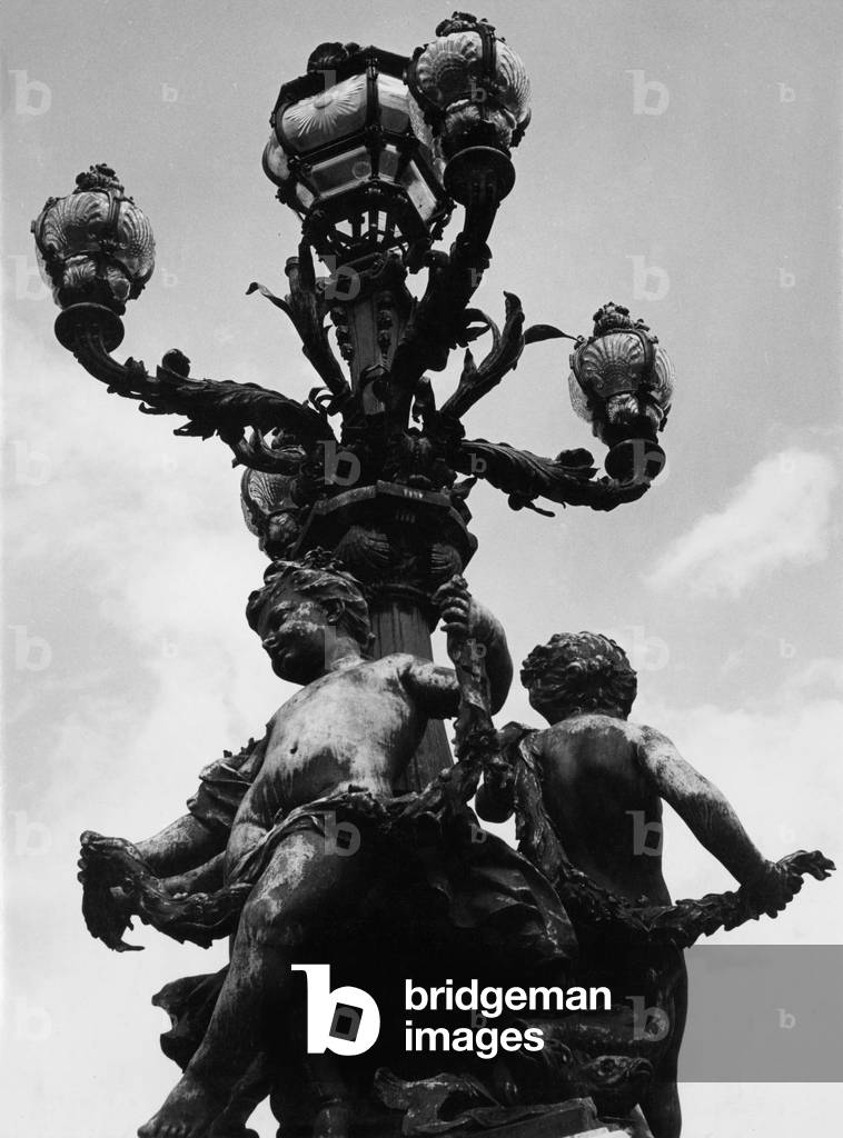 A decorated lamp in Paris, 1960 (b/w photo)
