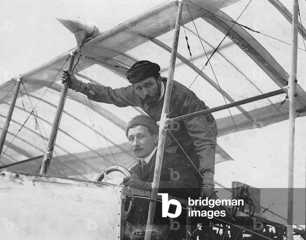 Henri Farman and Pelagrange in an airplane, 1900 (b/w photo)