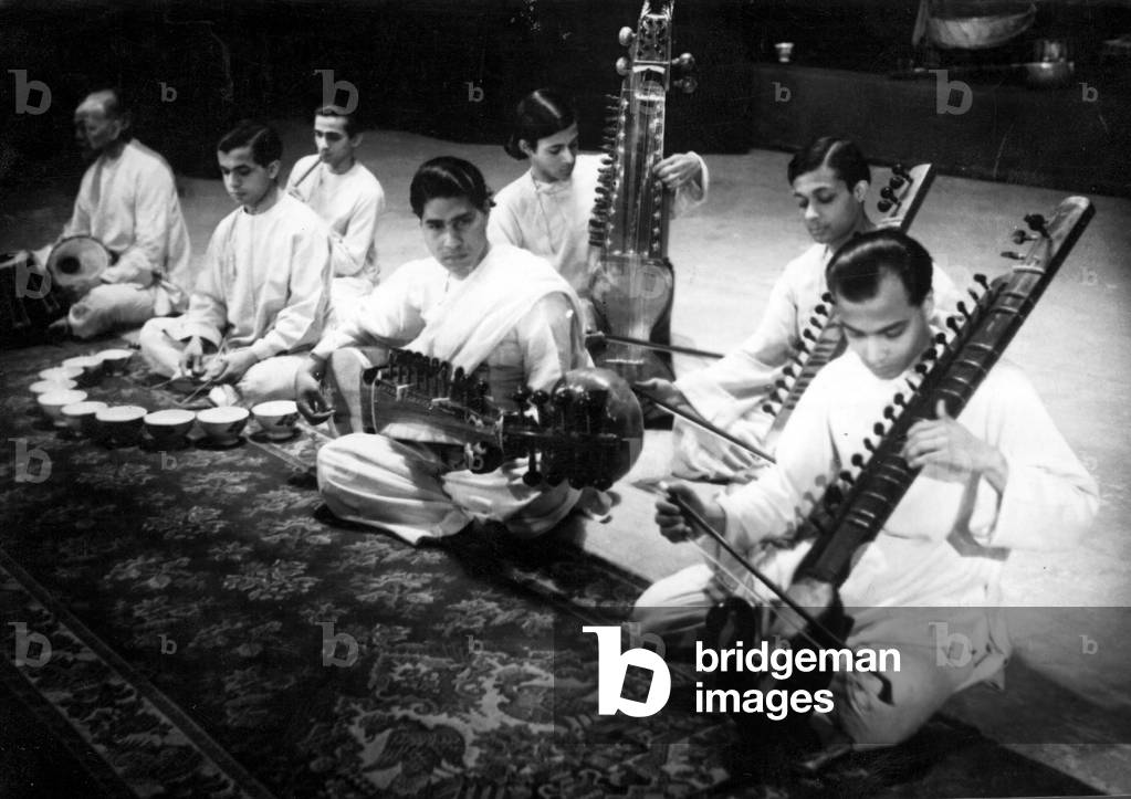 Indian music group with string instruments (b/w photo)
