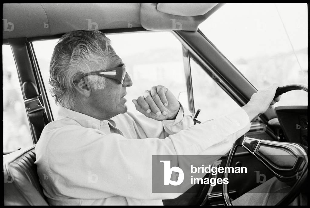 Gianni Agnelli in a Fiat in Corsica, 1975 (b/w photo)