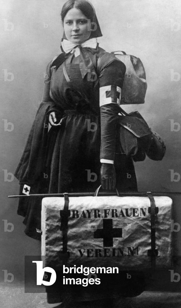 Nurse in field equipment, 1914 (b/w photo)