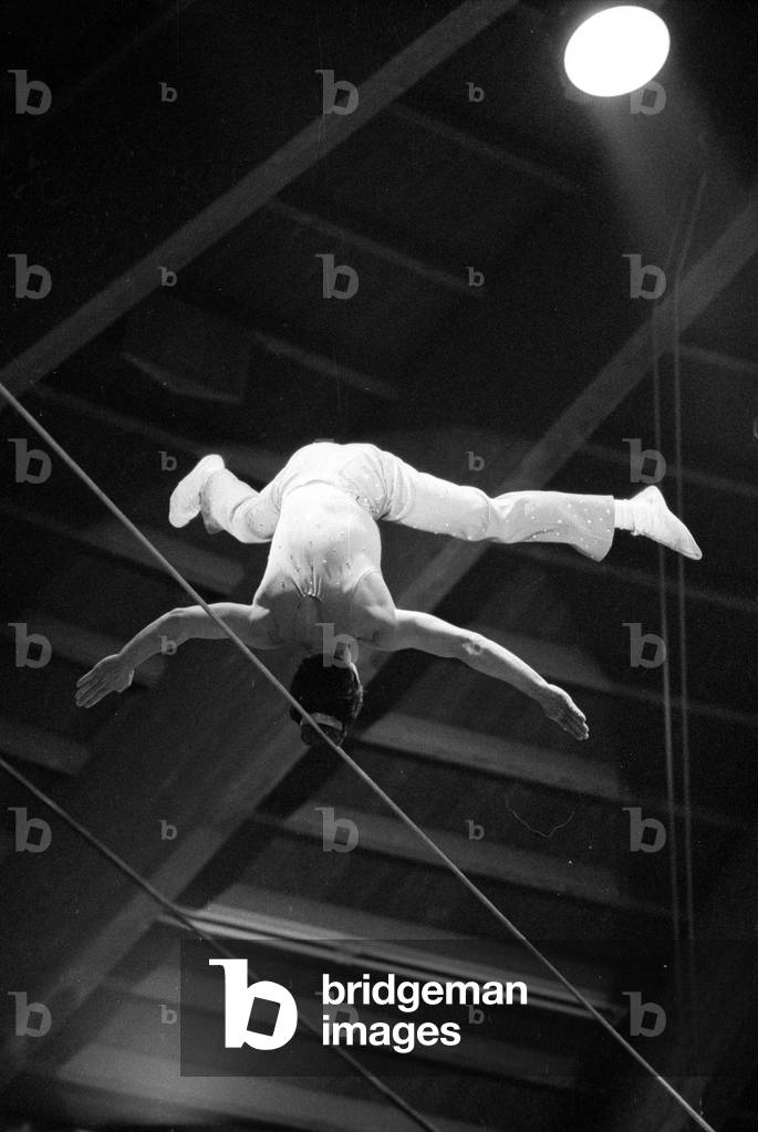 Tightrope artist in the circus, 1974 (b/w photo)