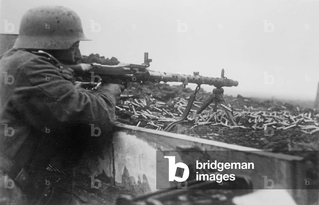 German Soldier with a MG 34, 1942 (b/w photo)