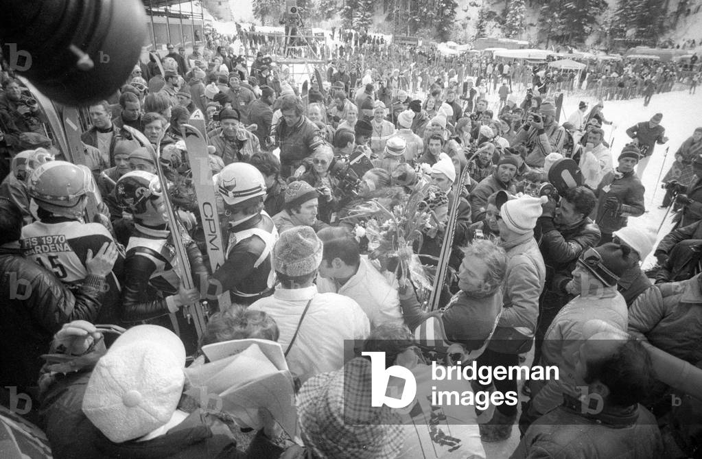 Journalists surround the winners of a competition, 1970 (b/w photo)