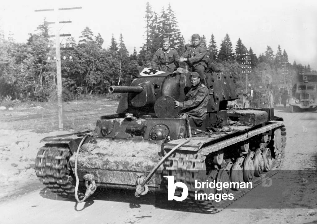 German soldiers on a Russian tank, 1941 (b/w photo)