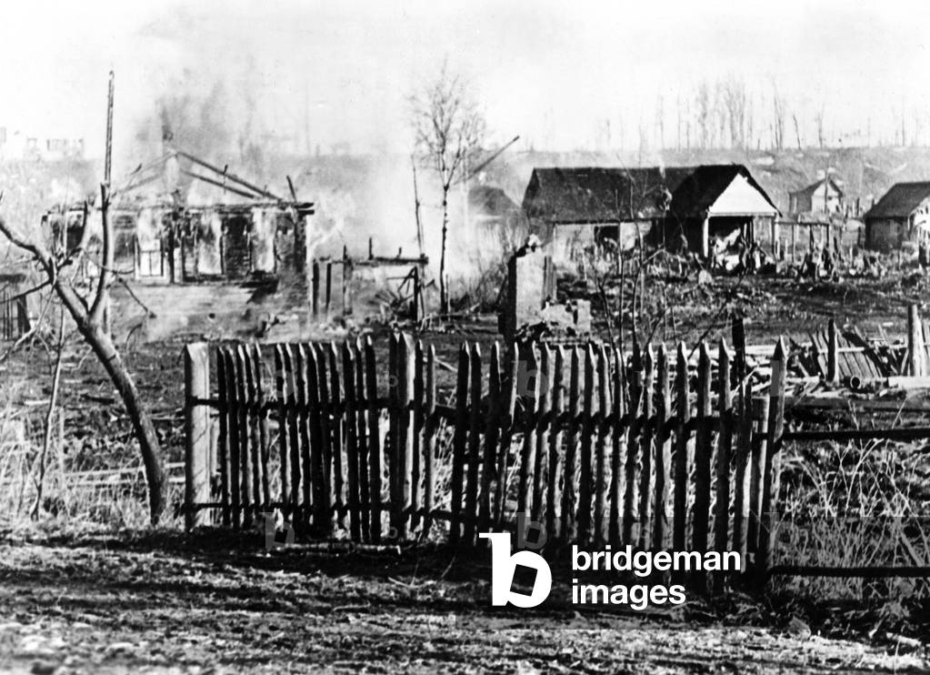Burning shed in Kholm, 1942 (b/w photo)