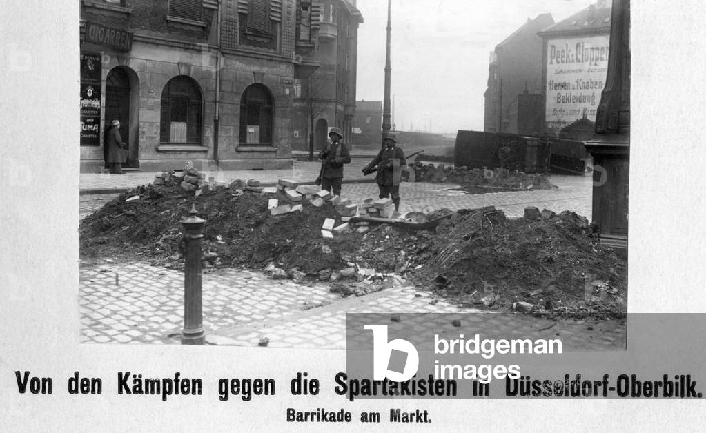 Street barricade at the market in Duesseldorf-Oberbilk, 1919