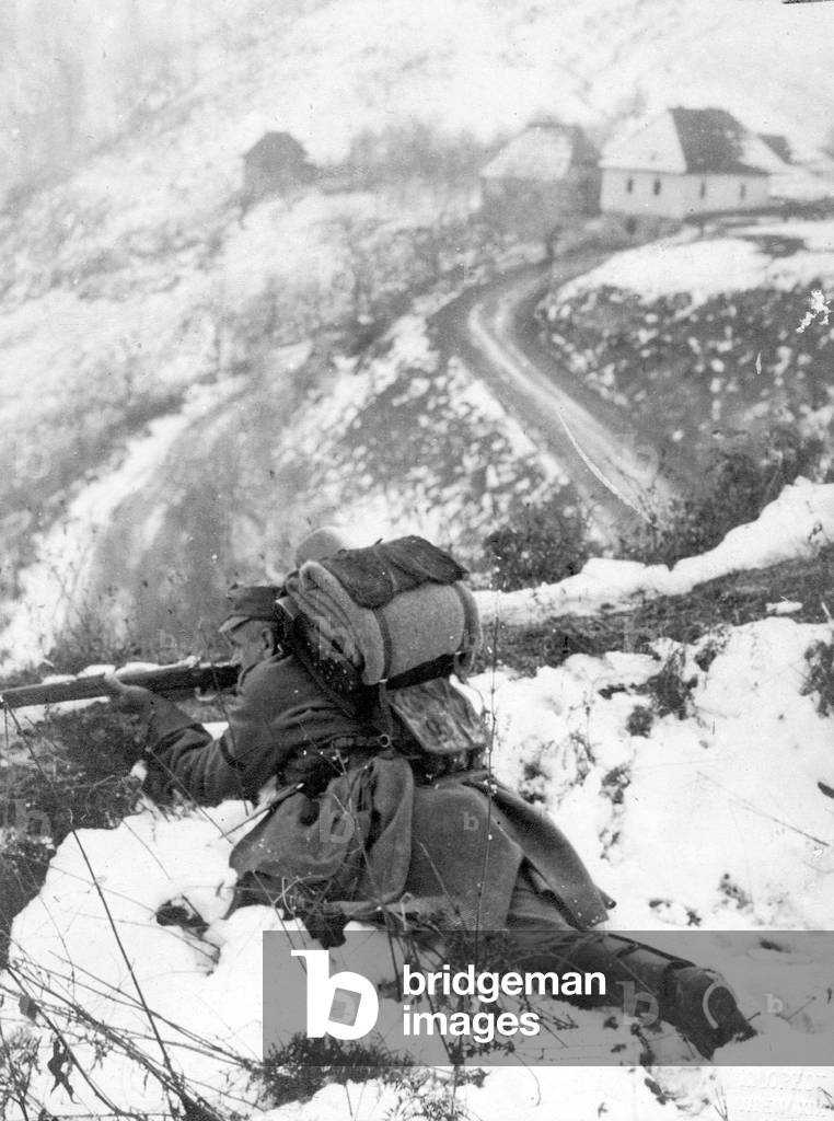 Austrian soldier during combat in Montenegro, 1915 (b/w photo)
