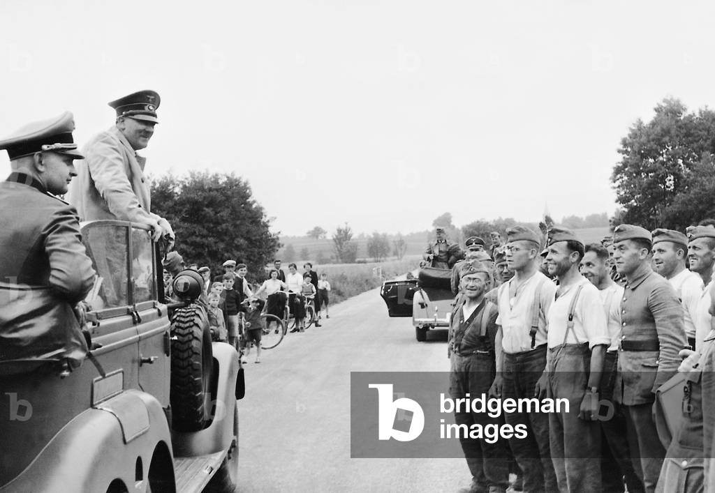 Adolf Hitler during a stop on the front in France, 1940 (b/w photo)