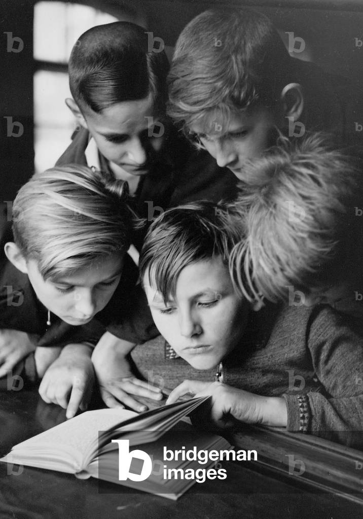 Boys reading, 1942 (b/w photo)
