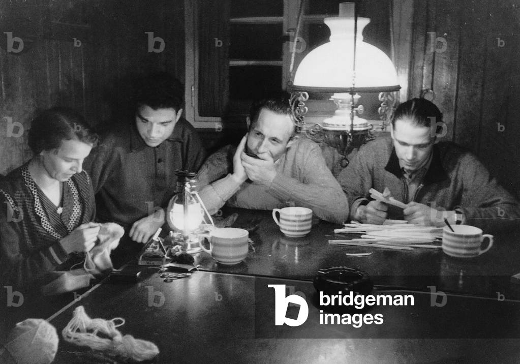 In the evening in a cottage, 1936 (b/w photo)