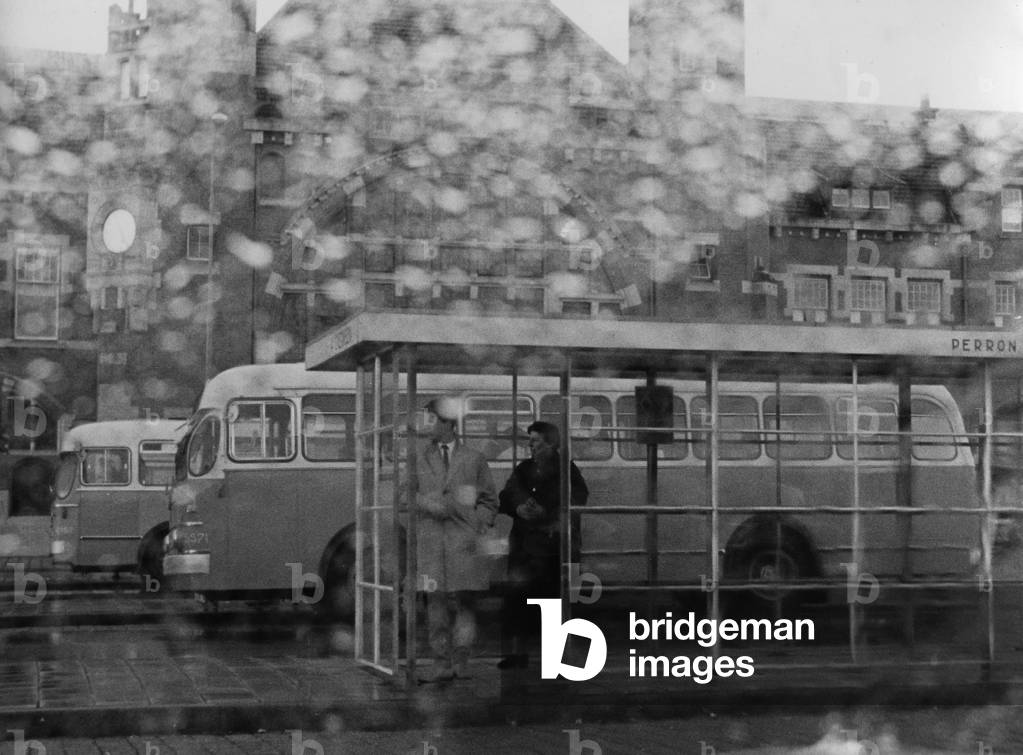 Bus stop in Haarlem, 1961 (b/w photo)