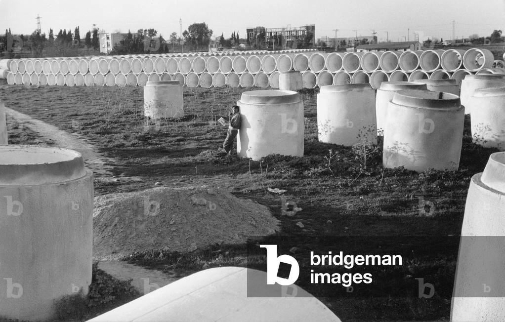 A pipe factory in Israel (b/w photo)