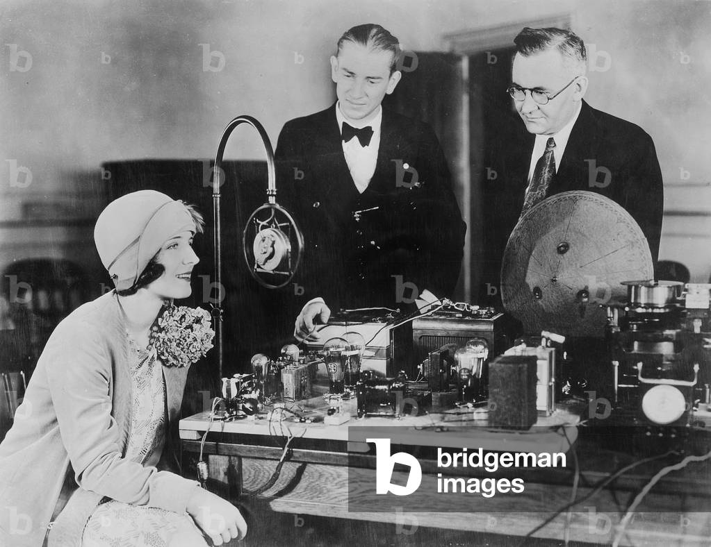 Norma Shearer at sound recording in a recording studio (b/w photo)