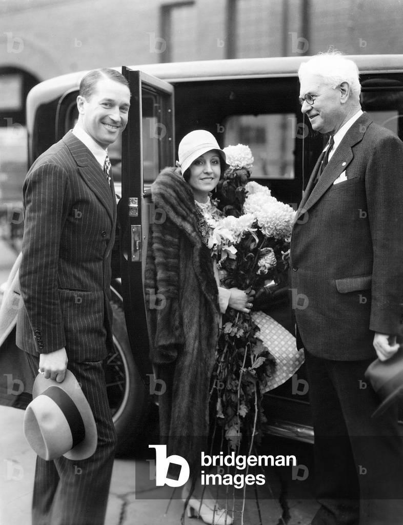 Maurice Chevalier and his wife Yvonne Vallee in Hollywood (b/w photo)
