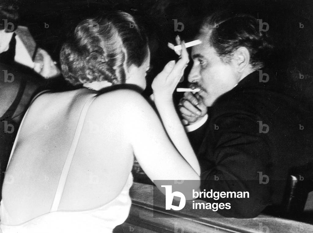 Marlene Dietrich talking with Josef von Sternberg, 1931 (b/w photo)
