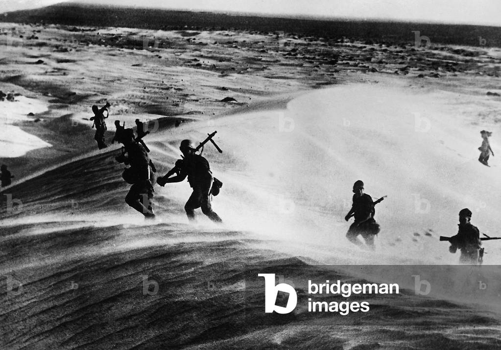 Soldiers of the German Africa Corps during the advance in the desert, 1941 (b/w photo)