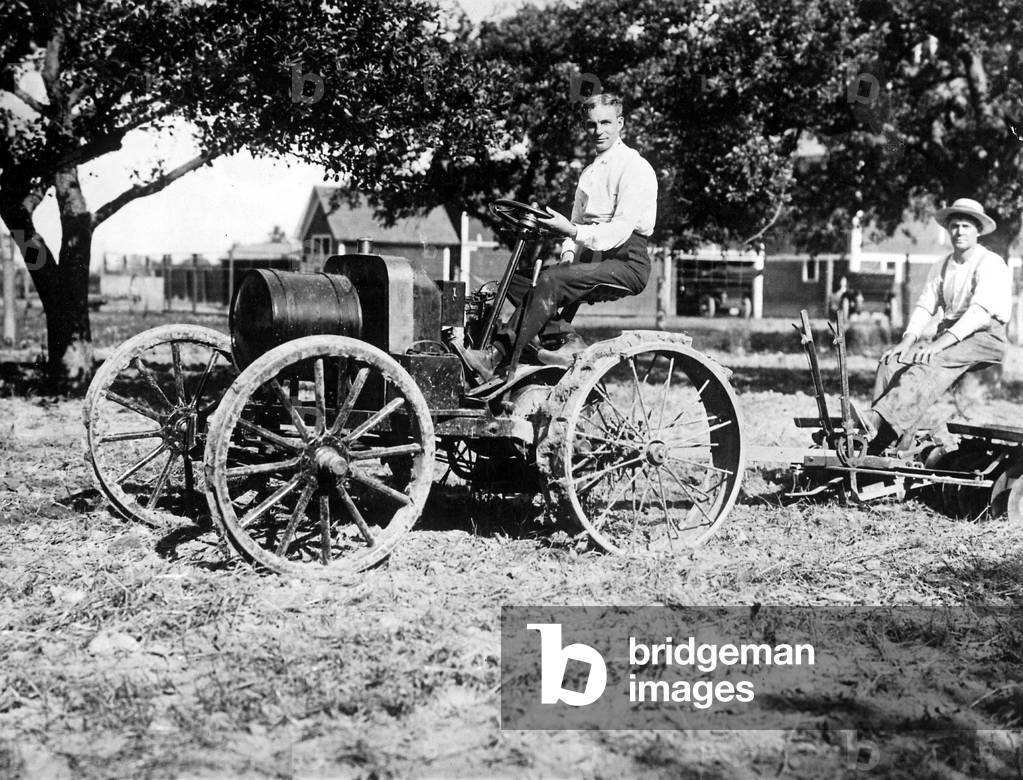 Henry Ford with an automobile earth roller, 1908 (b/w photo)