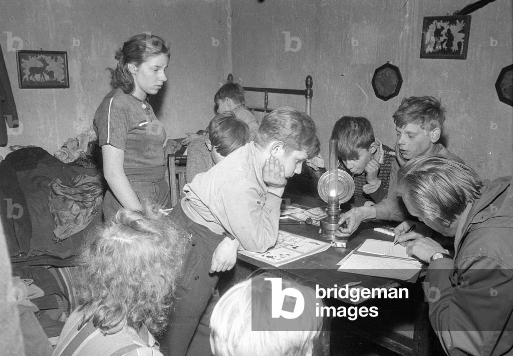 Refugee family in their home near Muenster, 1972 (b/w photo)