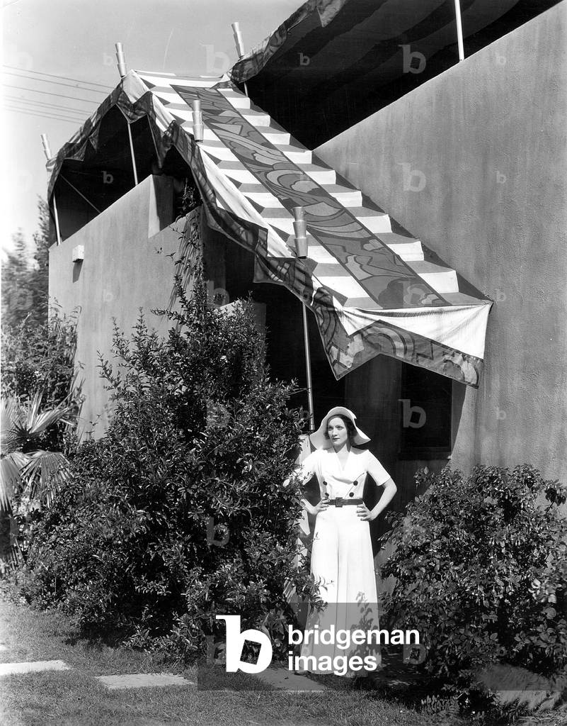 Marlene Dietrich in front of her house in Beverly Hills, 1934 (b/w photo)