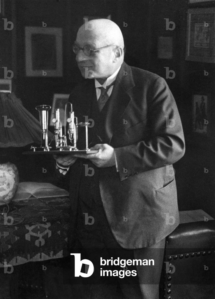 Fritz Haber with the model of a plant for the production of nitrogen, 1931 (b/w photo)