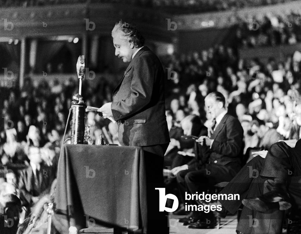 Albert Einstein speaks at an event in favour of a Refugee Foundation, Royal Albert Hall, London, 1933 (b/w photo)