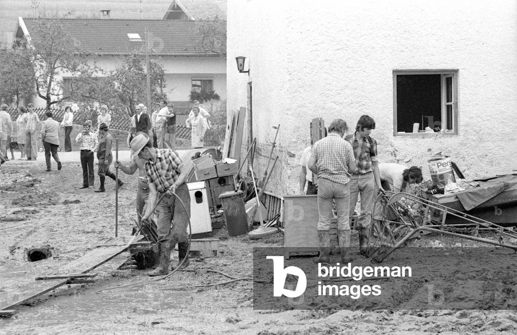 Cleaning up after a storm at Lake Chiemsee, 1974 (b/w photo)