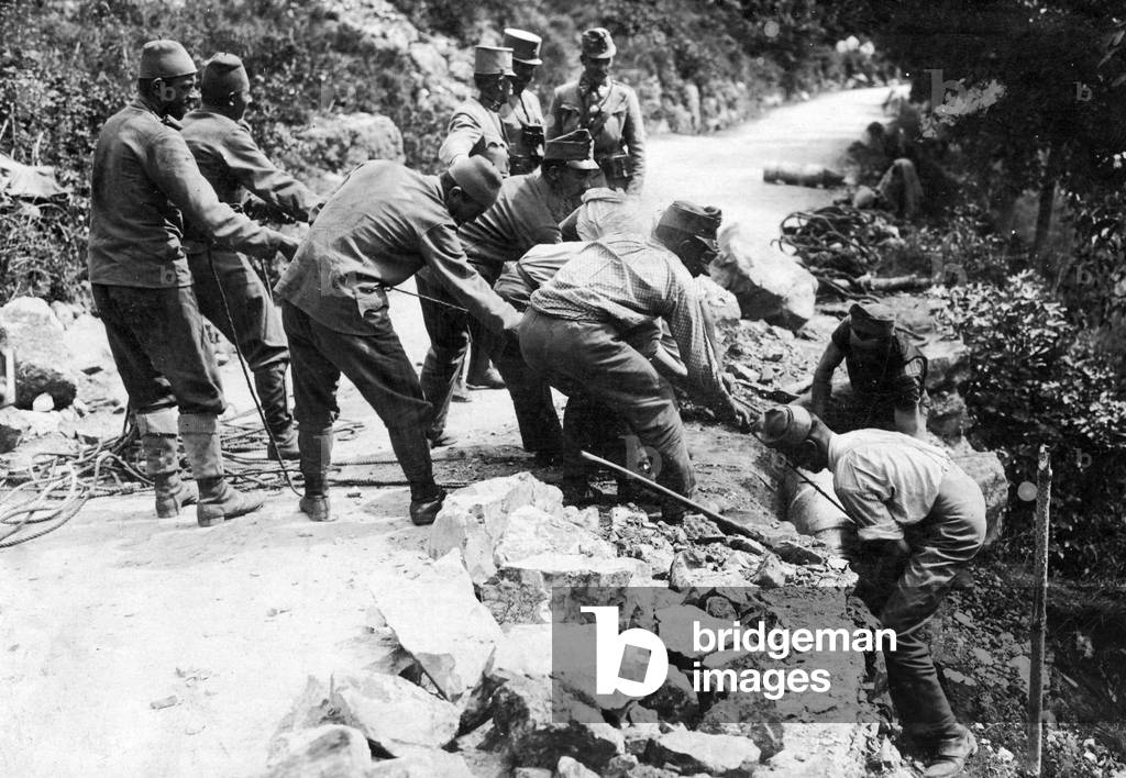 Austro-Hungarian soldiers recover munitions, 1917 (b/w photo)