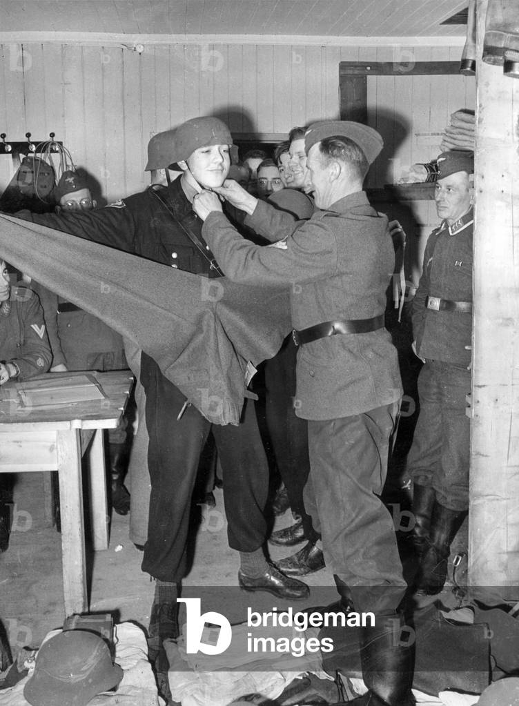 Hitler Youth dress as air force assistants, 1943 (b/w photo)