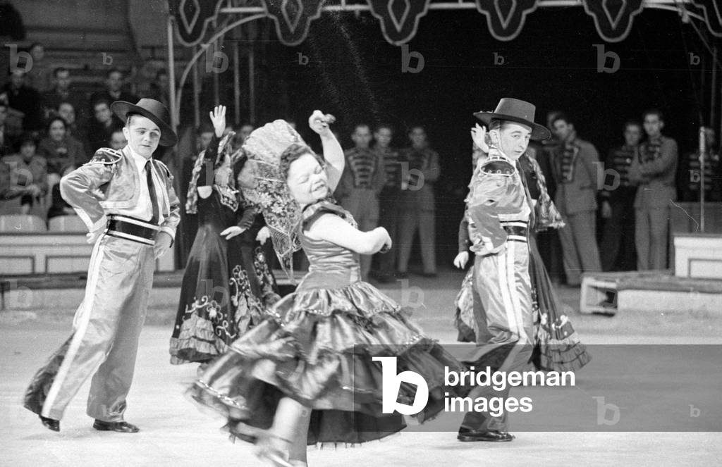 Midgets perform in a circus, 1953 (b/w photo)