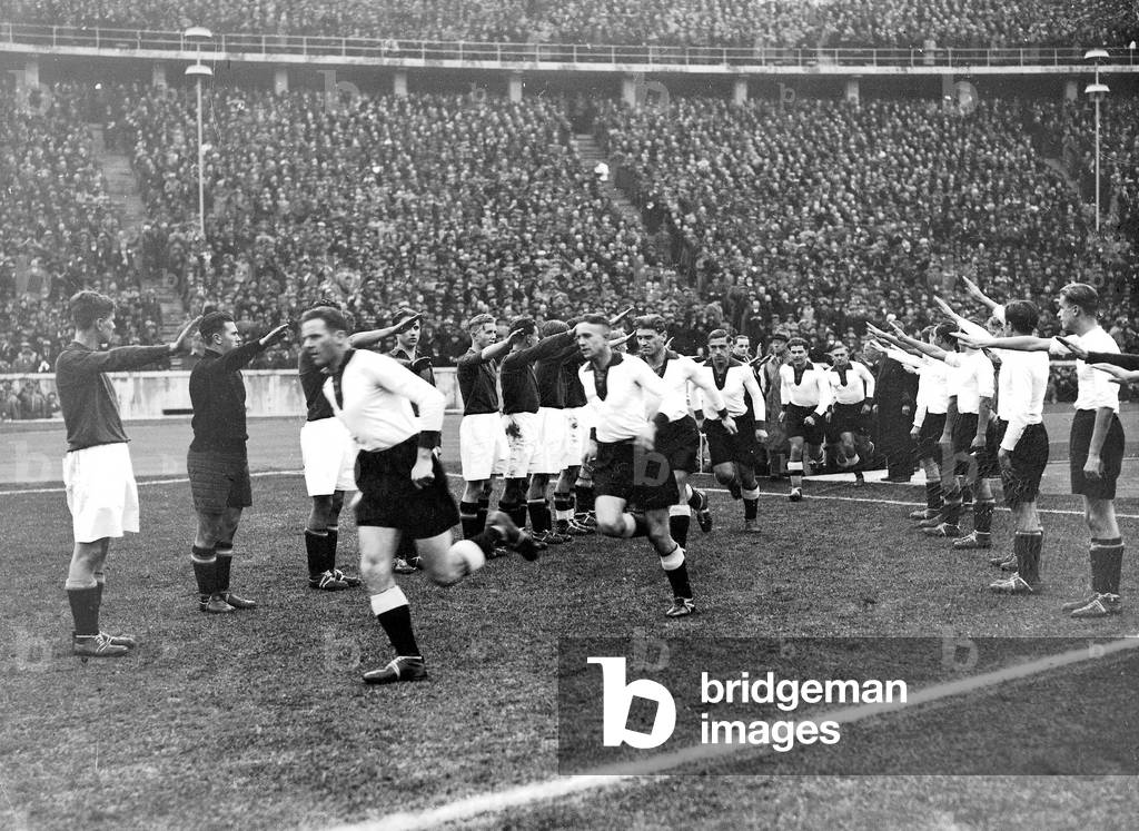 Football game: Germany versus Italy (b/w photo)