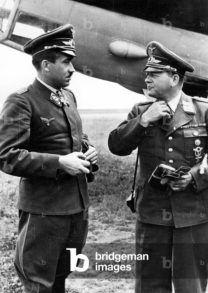 Erhard Milch speaking with Adolf Galland, 1943 (b/w photo)