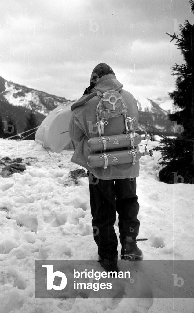 Mountaineer Mathias Rebitsch during preparations, 1954 (b/w photo)