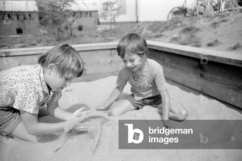 Child in the sandbox, 1974 (b/w photo)