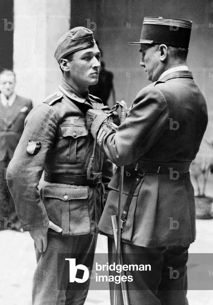 Awarding an order to a French volunteer, 1943 (b/w photo)