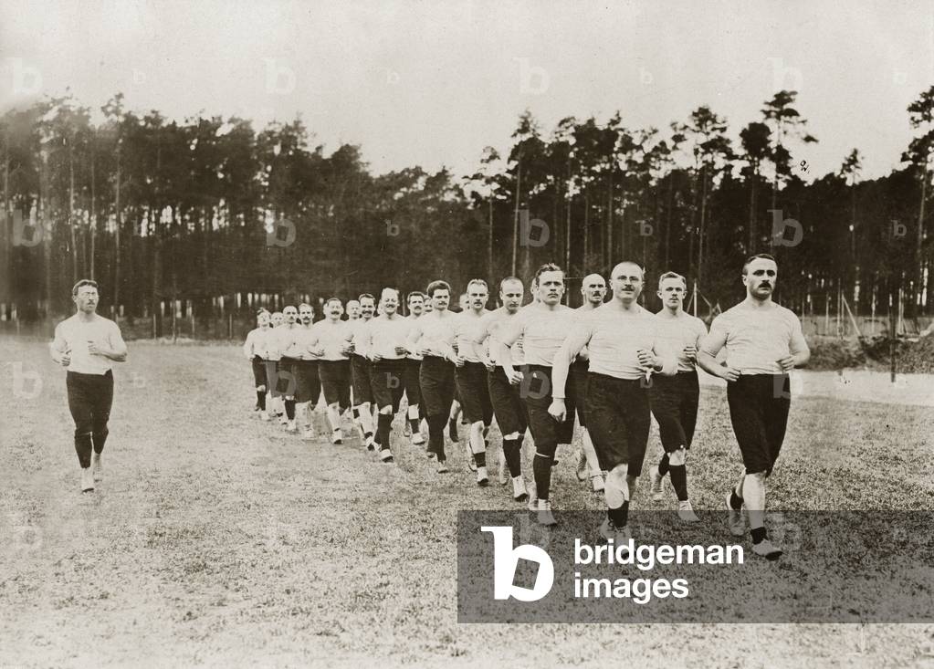 Men doing sports, 1919 (b/w photo)