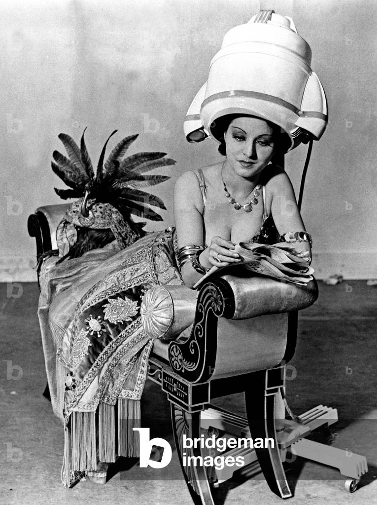 Woman under the hairdryer, 1963 (b/w photo)