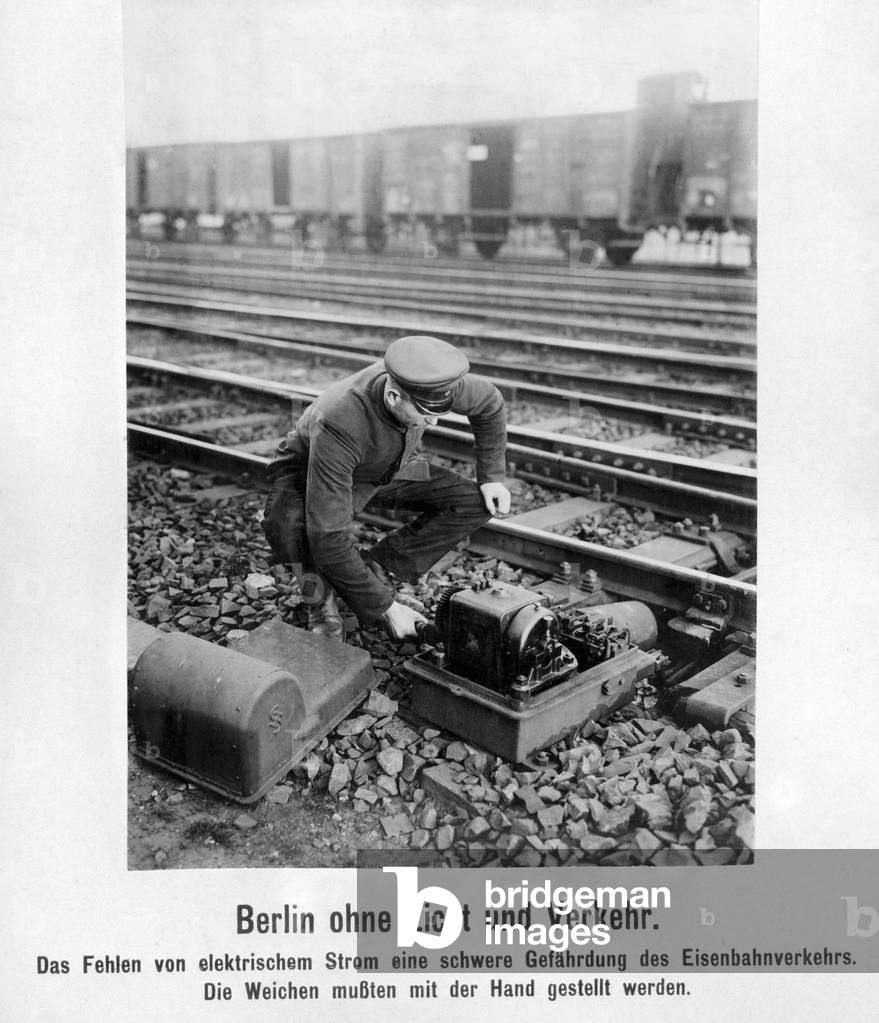 Changing the points manually during the traffic strikes in Berlin, around the 1920s