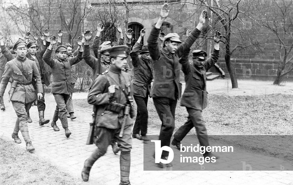 Arrested Communists are being lead away, 1921 (b/w photo)