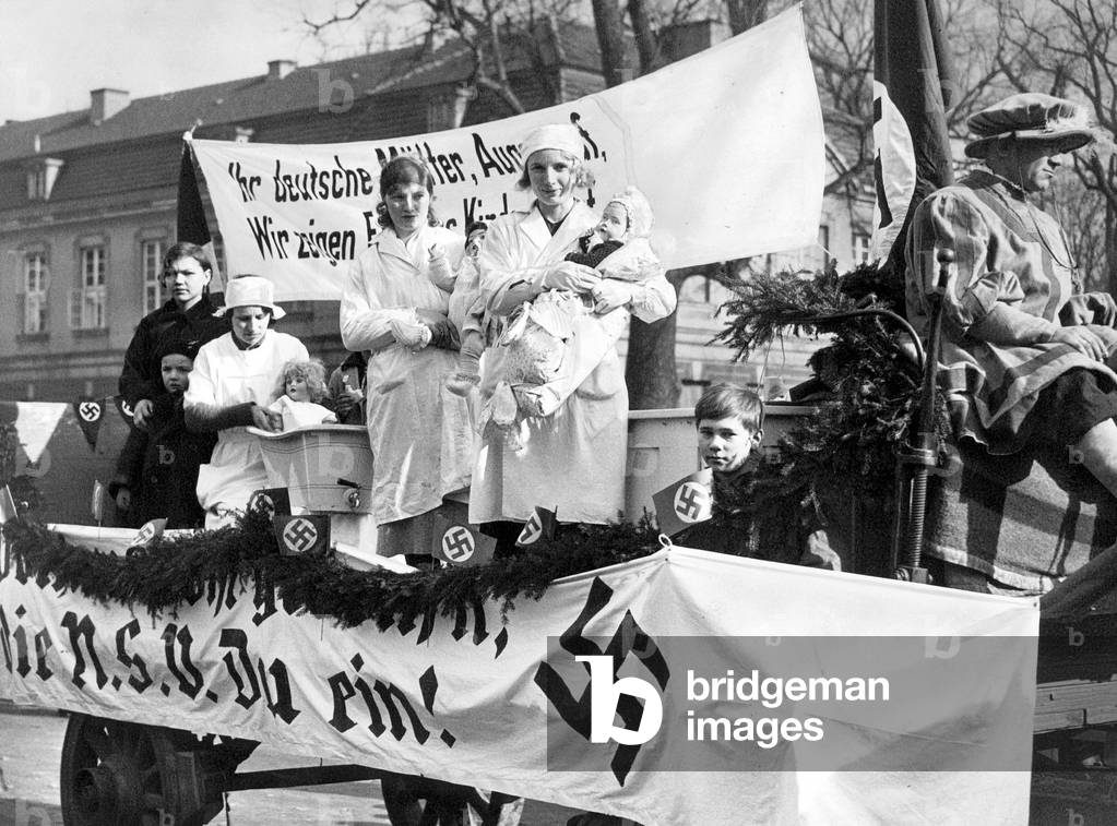 Car with a banner of the National Socialist People's Welfare (b/w photo)
