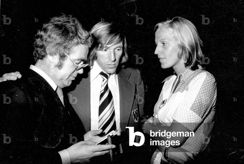 Günther Netzer and Brigitte Beckenbauer at the celebration of the World Cup victory in Munich, 1974 (b/w photo)