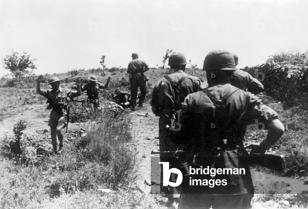 British soldiers give in to German paratroopers in Crete in 1941 (b/w photo)