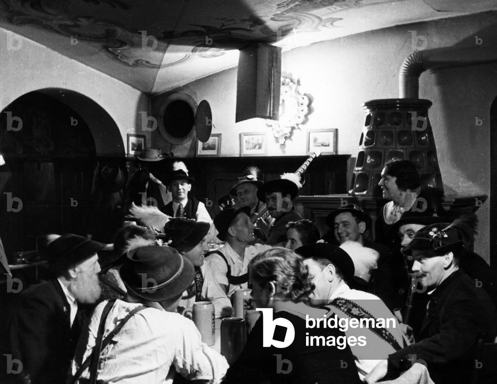 Evening in traditional costumes in Garmisch, 1935 (b/w photo)
