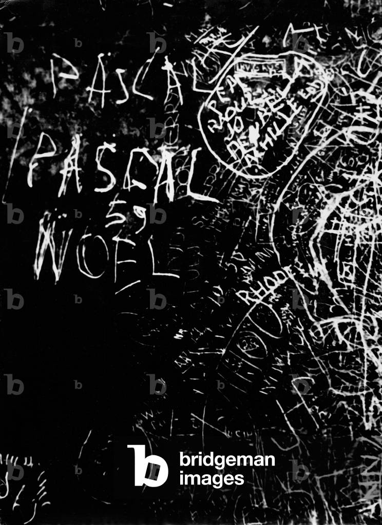 A smeared wall in Paris, 1959 (b/w photo)