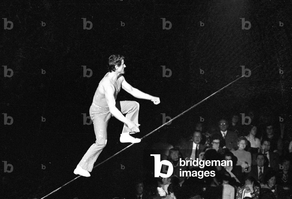 Tightrope artist in the circus, 1974 (b/w photo)