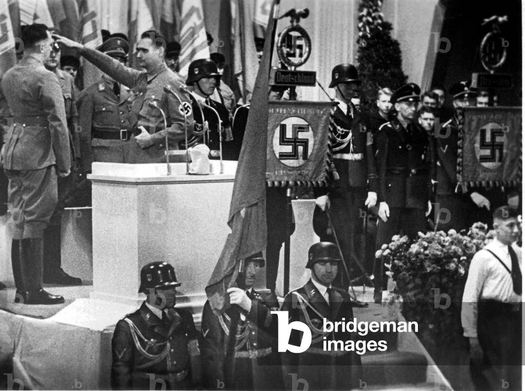 Rudolf Hess at admission of the Sudeten-German-Party into the NSDAP, 1938 (b/w photo)
