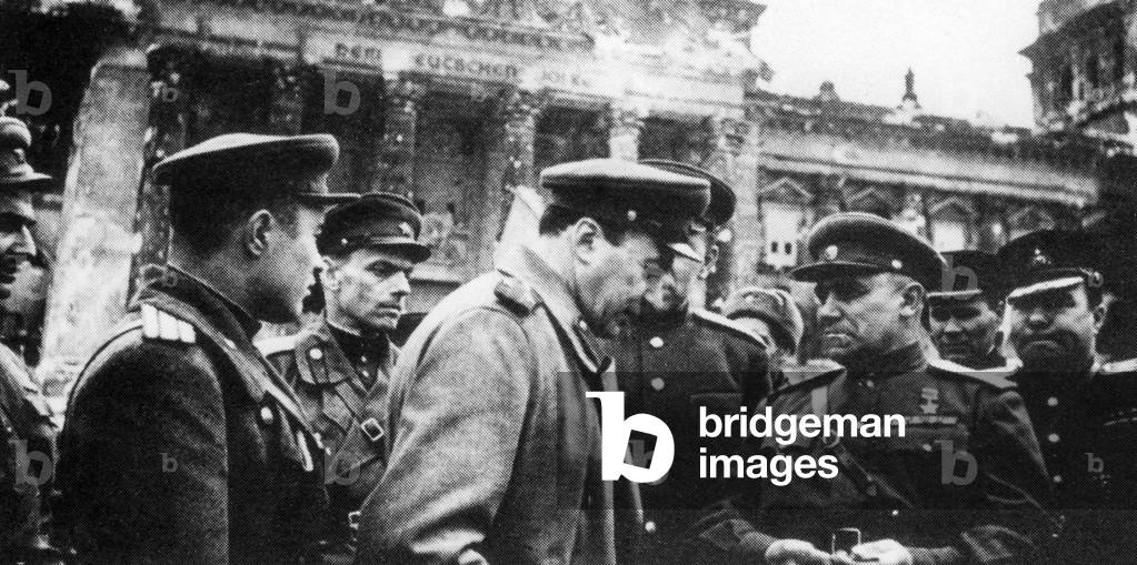 Colonel-General Berzarin in front of the ruin of the Reichstag, 1945
